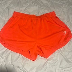 Bright orange gym shark shorts size small